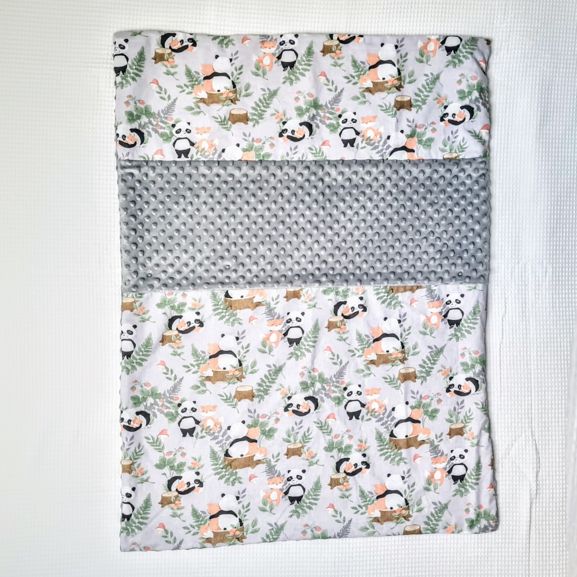 Couverture vu côté tissu à motif