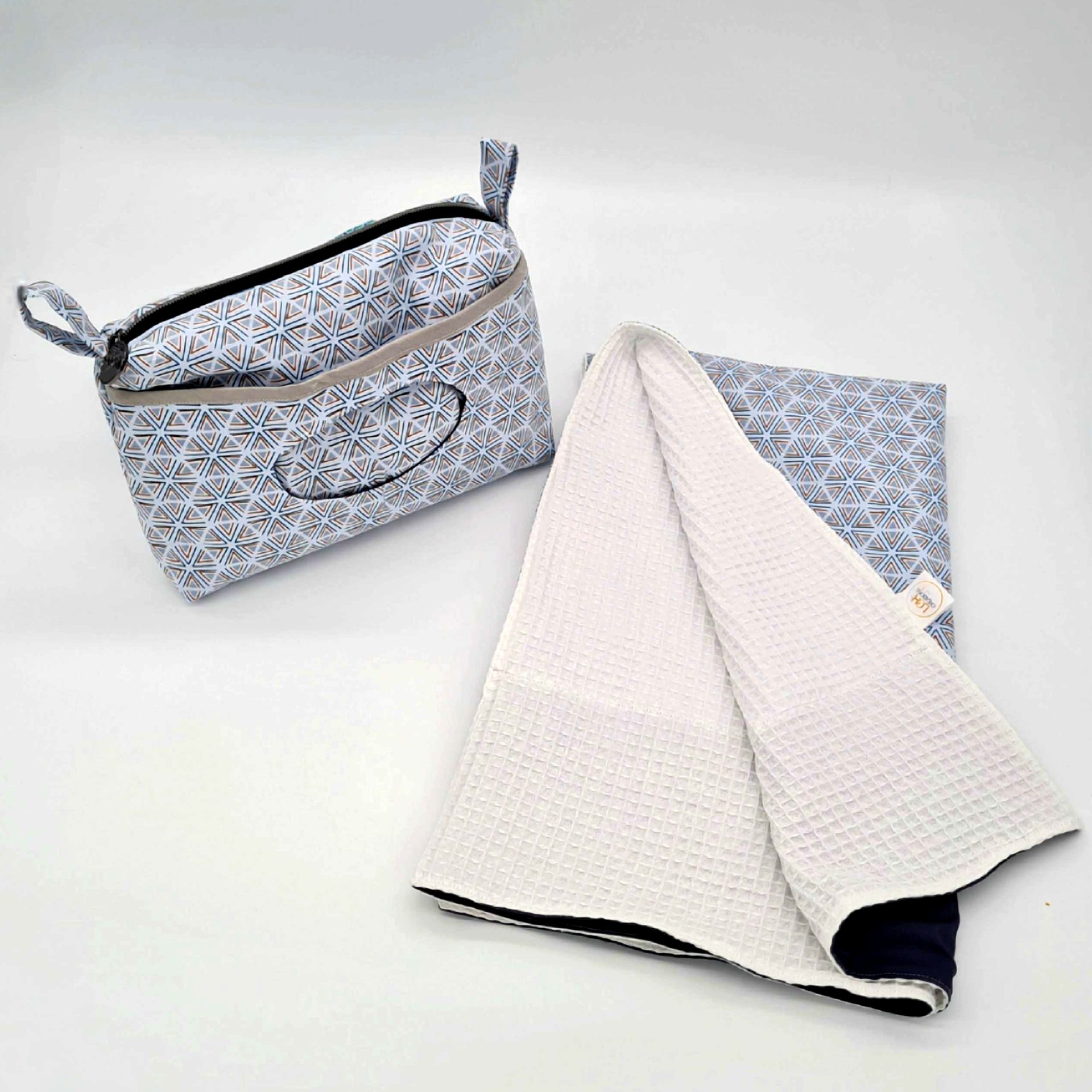 Trousse à langer et son tapis assorti