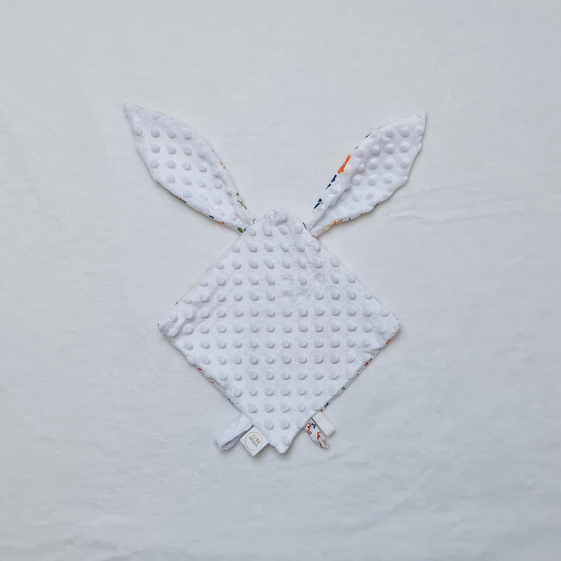 doudou à personnaliser vu côté minky blanc à personnaliser